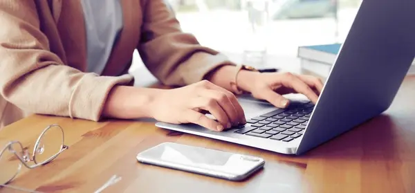 young-woman-working-on-computer-600nw-1711024264.webp